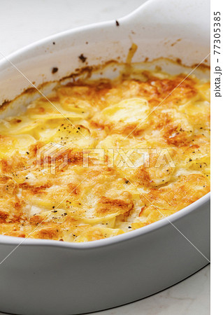still ife of baked potatoes with cheese 77305385
