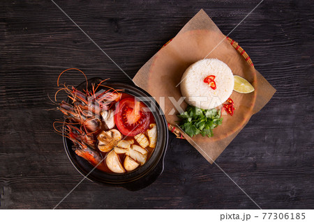 tomato soup with champignons, shrimp, boiled rice, greens and lime 77306185