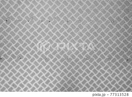 Dark metallic stainless steel floor pattern surface texture. Close-up of interior material for design decoration background Dark metallic stainless steel floor pattern surface texture. Close-up of interior material for design decoration background 77313528