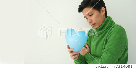 Asian ethnic LGBT tomboy sad expression disappointed in love and relationship Asian ethnic LGBT tomboy sad expression disappointed in love and relationship 77314081