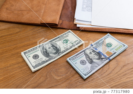 Background with cash money american hundred dollar bills and docs. Flat lay. Top view 77317980