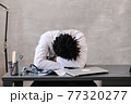 Funny bored at work african american doctor worker falling asleep at office desk, employee sleeping at workplace near laptop feel overworked concept 77320277