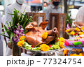 The pig's head sacrifice in the worship of house spirit in Asia tradition. 77324754
