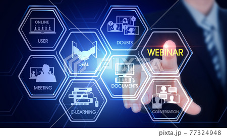 Webinar Hexagonal Touch Screen Concept Hexagonal virtual Touch Screen Concept with  man touching screen with finger and light streak 77324948