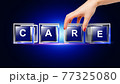 Care letter written on glass cube 77325080