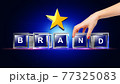 Brand letter written on glass cube 77325083