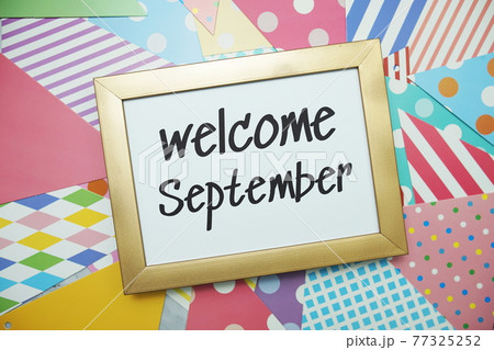 Welcome September text on colorful background Welcome September text on colorful background 77325252