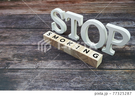 Stop Smoking Word alphabet letters on wooden background 77325287