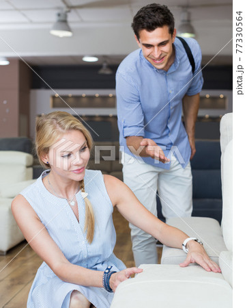 couple are choosing modern sofa couple are choosing modern sofa 77330564