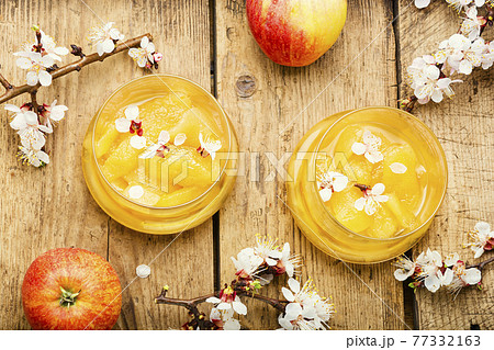 Homemade apple jam,wooden background 77332163