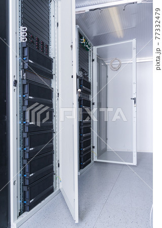 Server room with a row of server racks 77332479