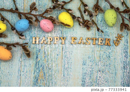 Easter eggs. Willow twigs. Holy Easter. Blue turquoise background. Happy Easter Easter eggs. Willow twigs. Holy Easter. Blue turquoise background. Happy Easter 77333941