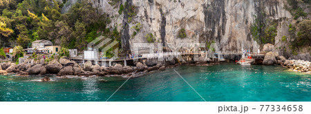 beautiful rocky berth of Punta Chiappa near Portofino in Liguria with sea walkway horizontal italy 77334658