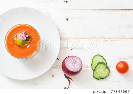 Gazpacho soup in glass on wooden table 77347667