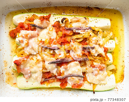 Zucchini baked with vegetables in baking dish 77348307