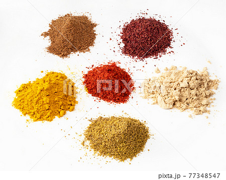 turmeric, nutmeg, sumac, ginger, paprika powders turmeric, nutmeg, sumac, ginger, paprika powders 77348547