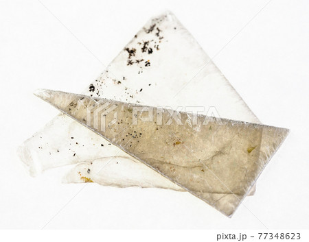 raw muscovite mica (common mica) sheets on white 77348623