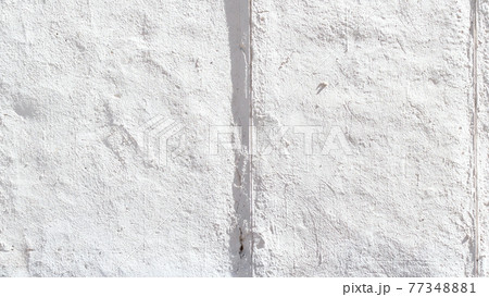white colored not smooth plastered wall white colored not smooth plastered wall 77348881