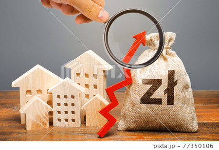 Polish zloty money bag and residential buildings with an up arrow. The concept of increasing the cost of housing. The growth of rent and mortgage rates. Raising rents, property taxes. Subsidized funds 77350106