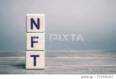 Wooden blocks NFT - non-fungible token. Digitally represented product or asset. Selling digital assets and art through auctions. Blockchain technology. Monetization, investment in cryptographic tokens Wooden blocks NFT - non-fungible token. Digitally represented product or asset. Selling digital assets and art through auctions. Blockchain technology. Monetization, investment in cryptographic tokens 77350107