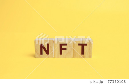 Wooden blocks NFT - non-fungible token. Digitally represented product or asset. Selling digital assets and art through auctions. Blockchain technology. Monetization, investment in cryptographic tokens 77350108