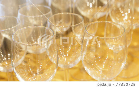 few radiant clean empty glasses stands on the table few radiant clean empty glasses stands on the table 77350728