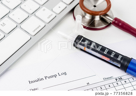 Insulin pump log record form and syringe wiht insulin. Insulin pump log record form and syringe wiht insulin. 77356828