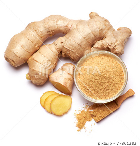 Fresh organic ginger and bowl of grinded spice isolated on white background 77361282