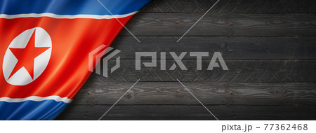 North Korean flag on black wood wall banner 77362468