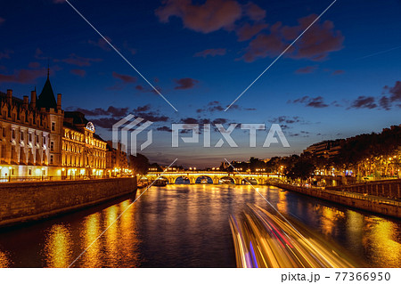 Illuminated Conciergerie at night - Paris, France 77366950