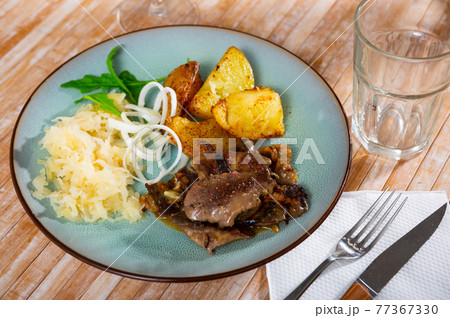 Appetizing fried rabbit liver with vegetables Appetizing fried rabbit liver with vegetables 77367330