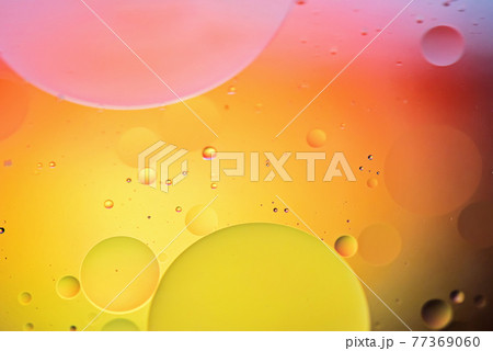 Colorful abstract background with oil drops on water Colorful abstract background with oil drops on water 77369060