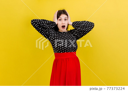 Young surprise or shocked woman pregnant isolated colored background. expression female Young surprise or shocked woman pregnant isolated colored background. expression female 77373224