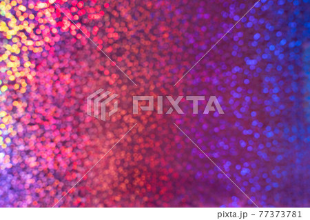 A rainbow sparkle background with colourful bokeh A rainbow sparkle background with colourful bokeh 77373781