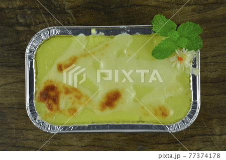 Baked Mashed Potatoes with Cheese in Foil tray Baked Mashed Potatoes with Cheese in Foil tray 77374178