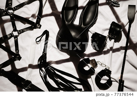 set of black leather sex toys for BDSM on the..