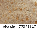 Fried tortilla, top view, texture of baked pastry, close-up 77378817