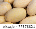 Elongated melon, fresh vegetables for sale 77378821