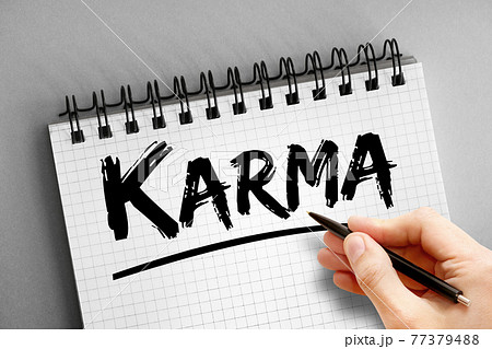 Karma text on notepad, concept background Karma text on notepad, concept background 77379488