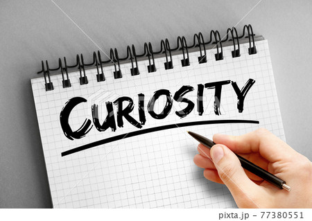 Curiosity text on notepad, concept background Curiosity text on notepad, concept background 77380551