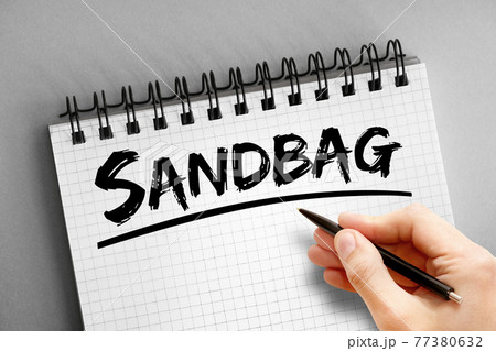 Sandbag text on notepad, concept background Sandbag text on notepad, concept background 77380632