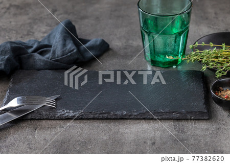 empty black stone plate empty black stone plate 77382620