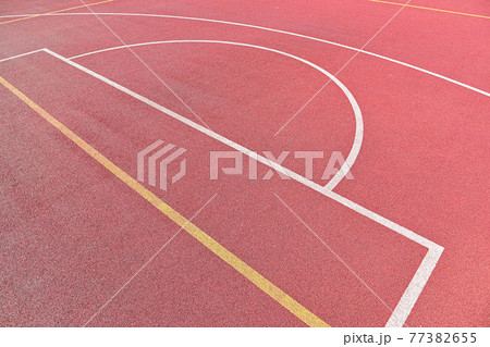 Basketball red outdoors court background 77382655
