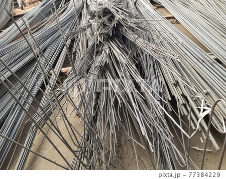 Steel rods used to reinforce concrete in construction Steel rods used to reinforce concrete in construction 77384229