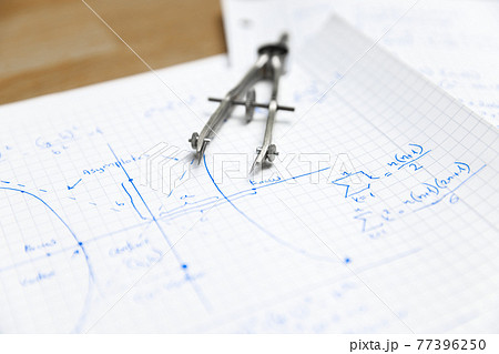 Math handwriting in notebook closeup Math handwriting in notebook closeup 77396250