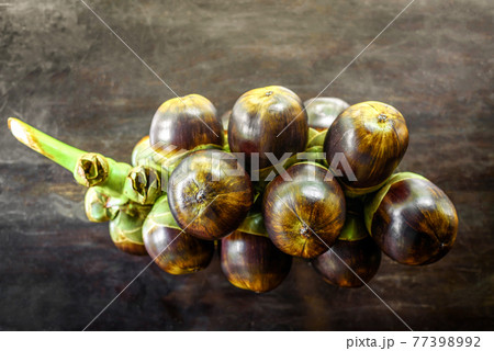 Fresh palmyra palm or toddy palm on wooden table 77398992