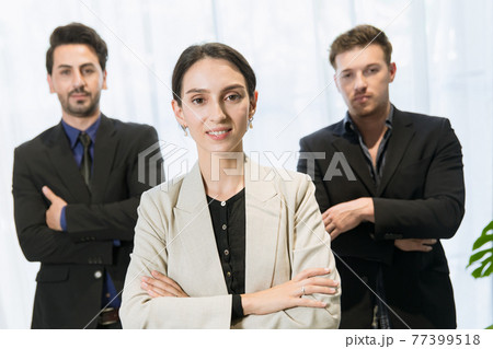 Smart businesswomen manager standing confident team group arm crossed with male teamwork in modern office happy smiling. Smart businesswomen manager standing confident team group arm crossed with male teamwork in modern office happy smiling. 77399518
