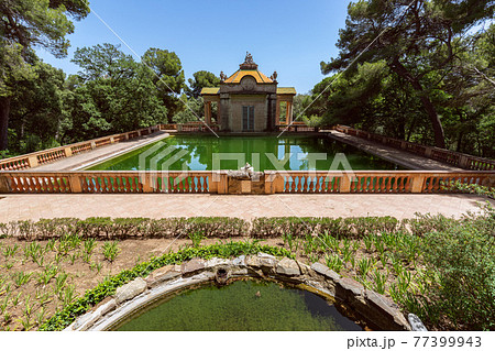 Emerald water pond in the famous Park of the Labyrinth of Horta (Parc del Laberint d'Horta) Emerald water pond in the famous Park of the Labyrinth of Horta (Parc del Laberint d'Horta) 77399943