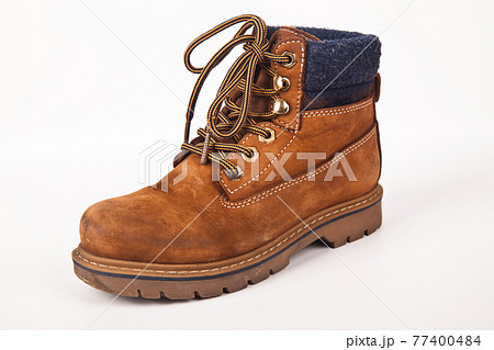 Hiking shoes and a white background, Sturdy hiking boots 77400484