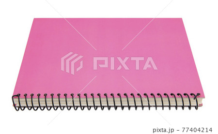 Pink spiral notebook isolated on white background 77404214